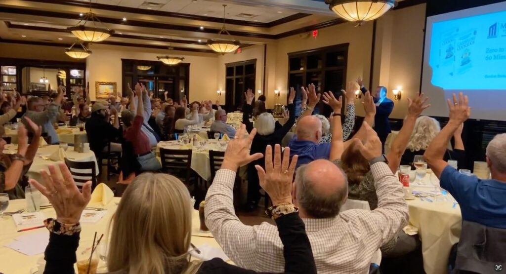 audience reacts to Gordon Stein speaking
